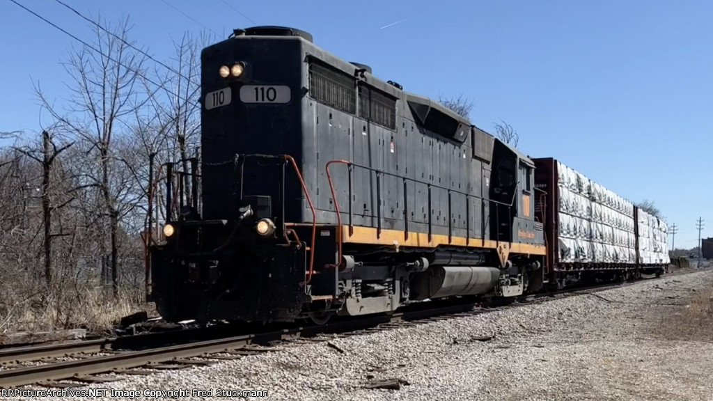 WE 110 has come out of Brittain Yard with cars for Carter Lumber.